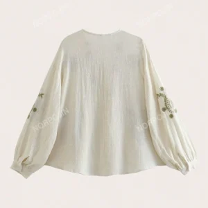 Blouse à manches lanternes et volant