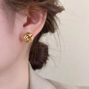 1 paire de boucles d’oreilles avec design tressé