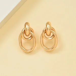 1 paire de boucles d’oreilles à tige dorées