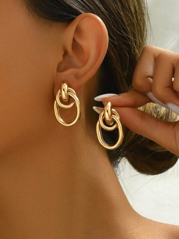 1 paire de boucles d'oreilles à tige dorées