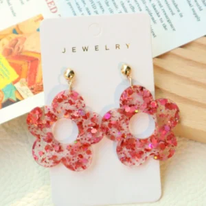 1 paire de boucles d’oreilles à fleurs ajourées pailletées