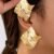Boucles d'oreilles géométriques carrées dorées