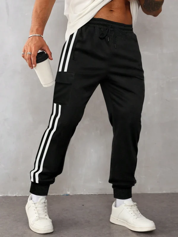 Manfinity Pantalon jogging bandes latérales