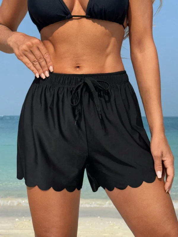 Swim SPRTY Short plage unicolore bordure coquille
