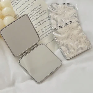 Miroir double-face ondulé