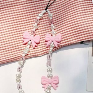 Lanière papillon perle rose