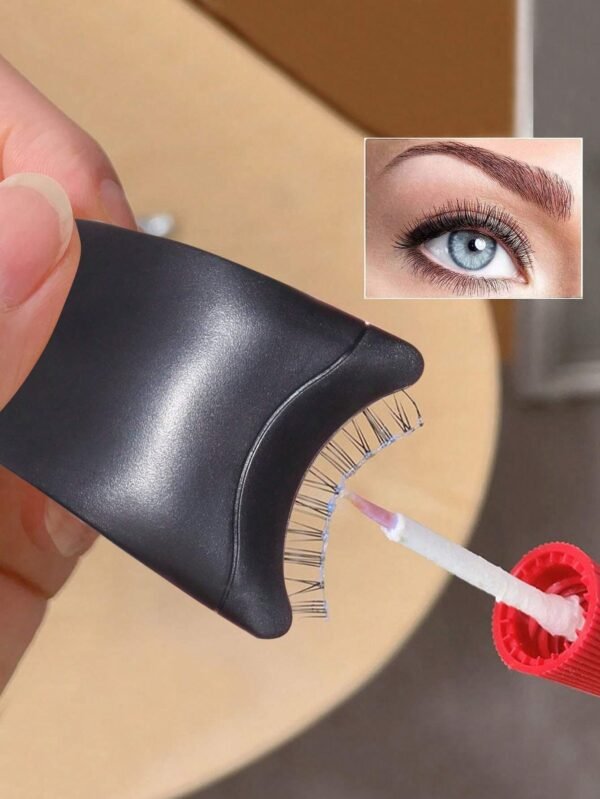 1 pince faux cils noir