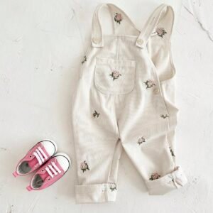 Pantalon brodé à bretelles
